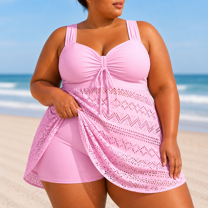 Comfortable plus size swim dress, elegant women's swimwear offering flattering modest coverage for beach days.