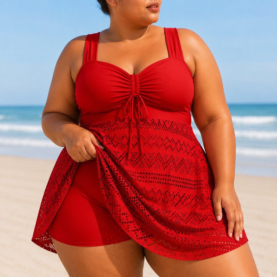 Women's plus size elegant swim dress, stylish and modest beachwear, perfect for a flattering summer vacation look.