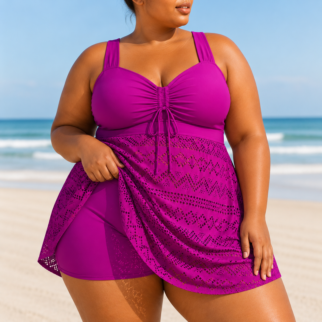 Flattering women's plus size elegant swim dress, comfortable modest beach swimwear for summer resort vacations.
