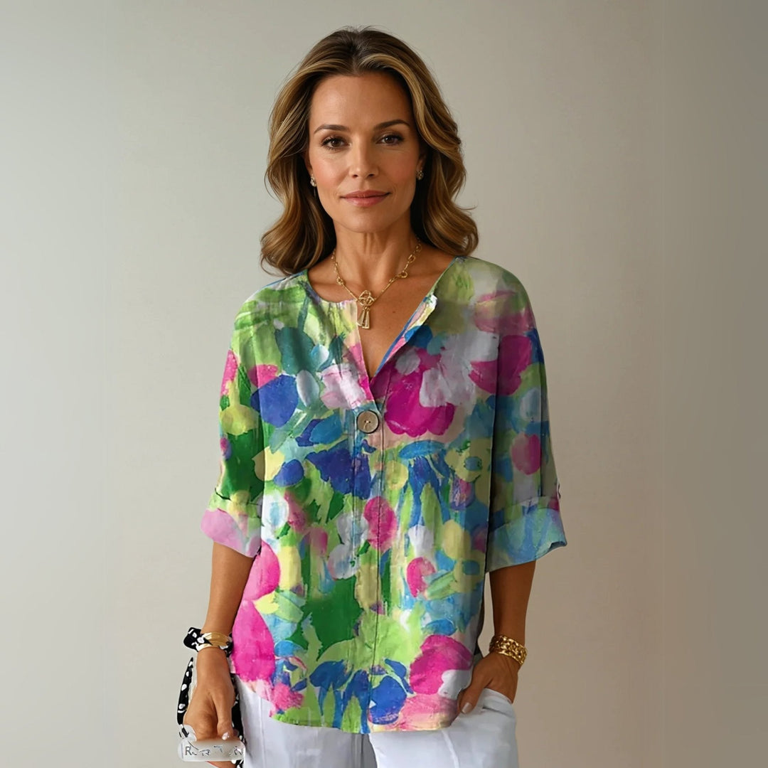 Casual plus size floral print blouse, V-neck, button-up. Ideal for stylish spring & summer fashion.