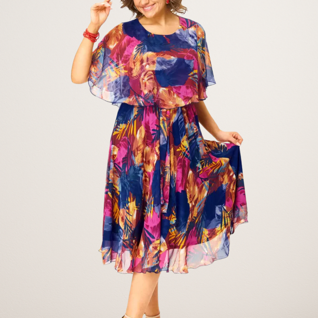 Women's plus size flowy summer midi dress with vibrant print, comfortable A-line for elegant casual style.