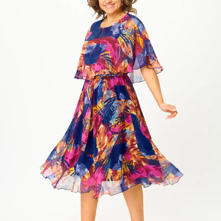 Comfortable women's plus size flowy summer dress, elegant A-line midi with a vibrant print, ideal for casual wear.