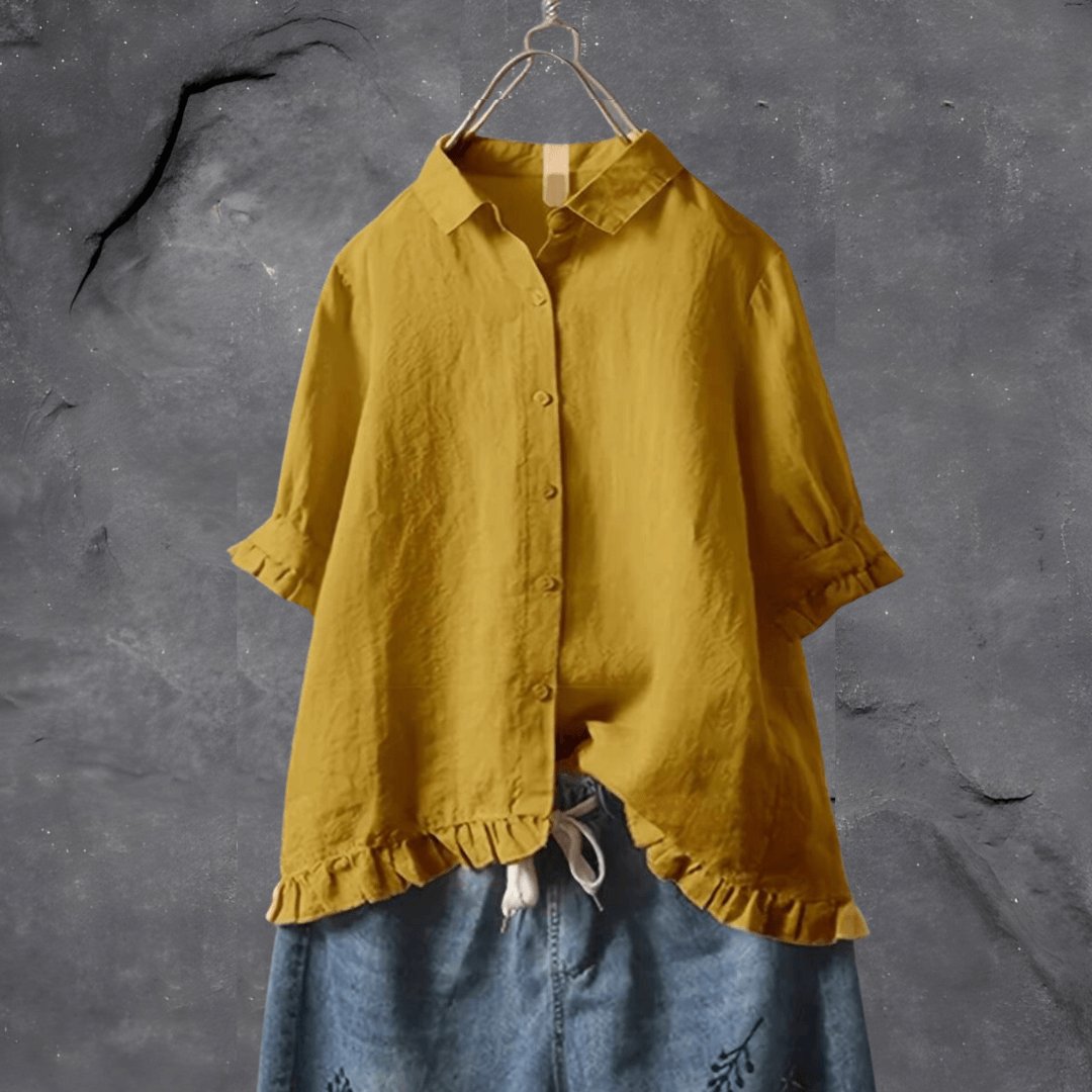 Women's plus size ruffled collared blouse with short sleeves, button front. Ideal for curvy fashion & work wear.