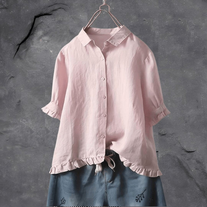 Versatile women's plus size collared shirt with ruffled details, short sleeves. A stylish button-front top for curvy.