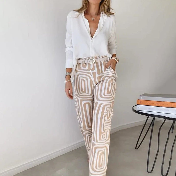 Elegant plus size two-piece outfit: long sleeve button-up shirt & geometric print pants for a chic fashion set.