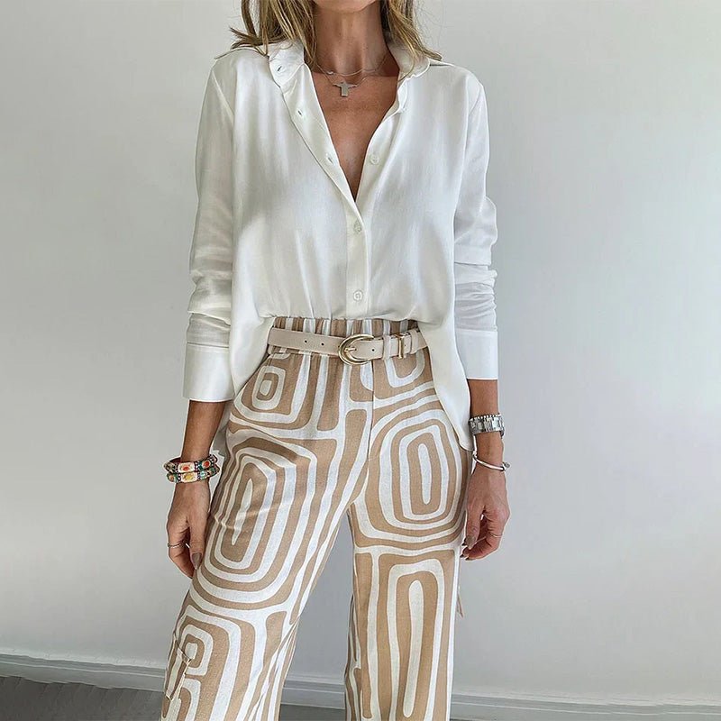 Comfortable plus size two-piece set for women: stylish button-up top & trendy patterned trousers. Perfect for work.