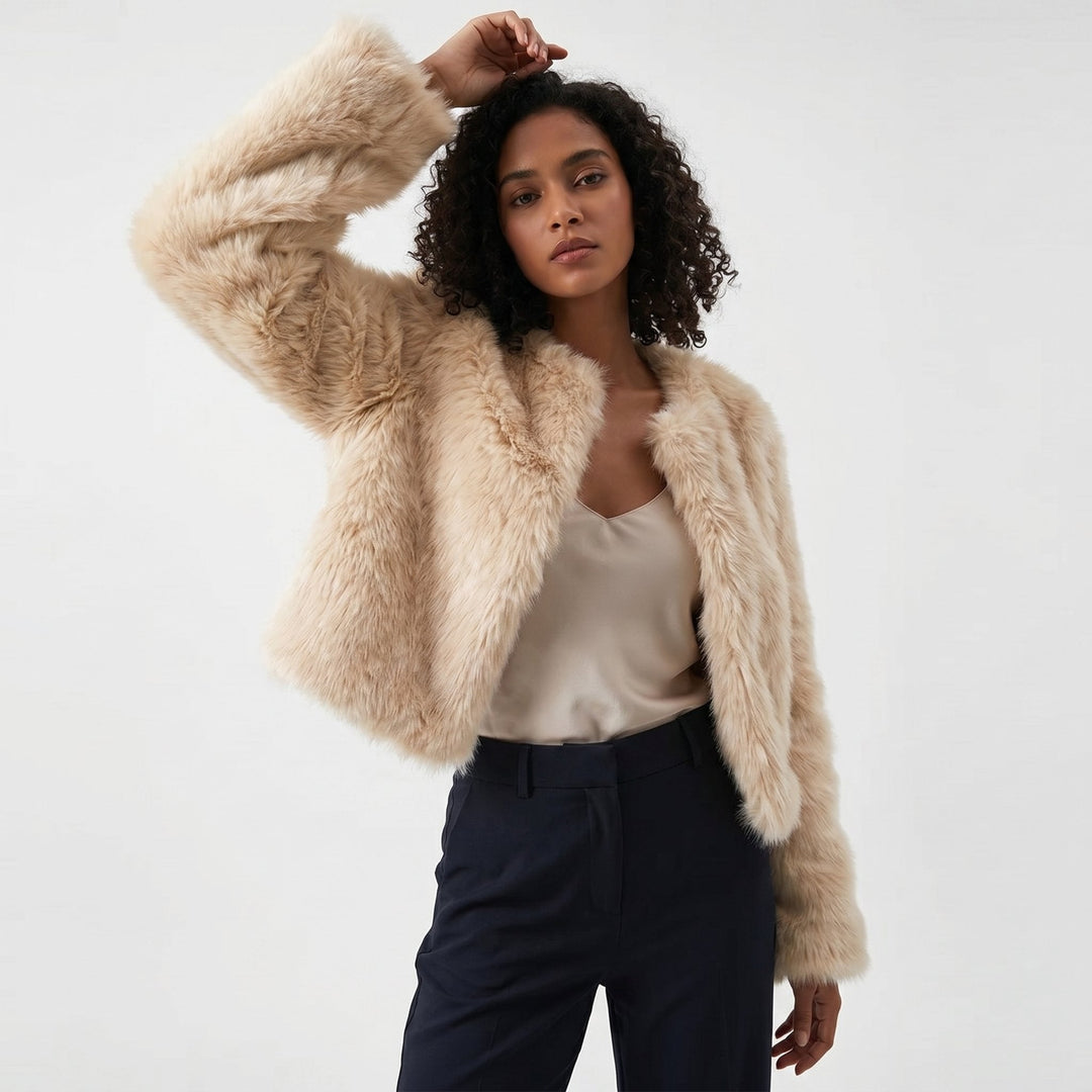 Plush cropped faux fur jacket for women, a stylish and warm winter outerwear piece.