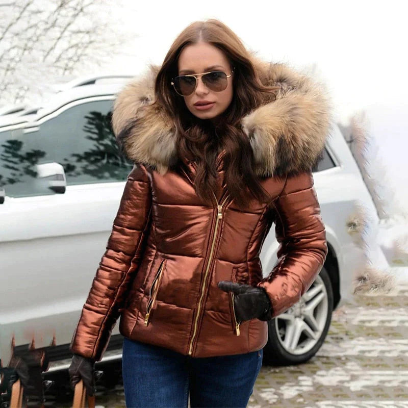 Stylish women's quilted puffer jacket with soft faux fur hood, a warm winter coat.