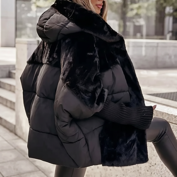Soft plush women's coat with hood, perfect for a chic and cozy winter look. Elegant warm outerwear.