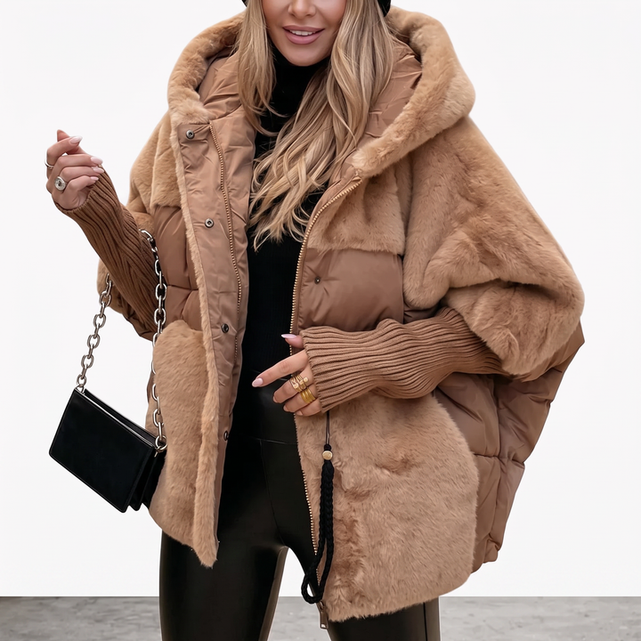 Fashionable women's plush hooded coat, offering ultimate coziness and warmth for elegant winter style.