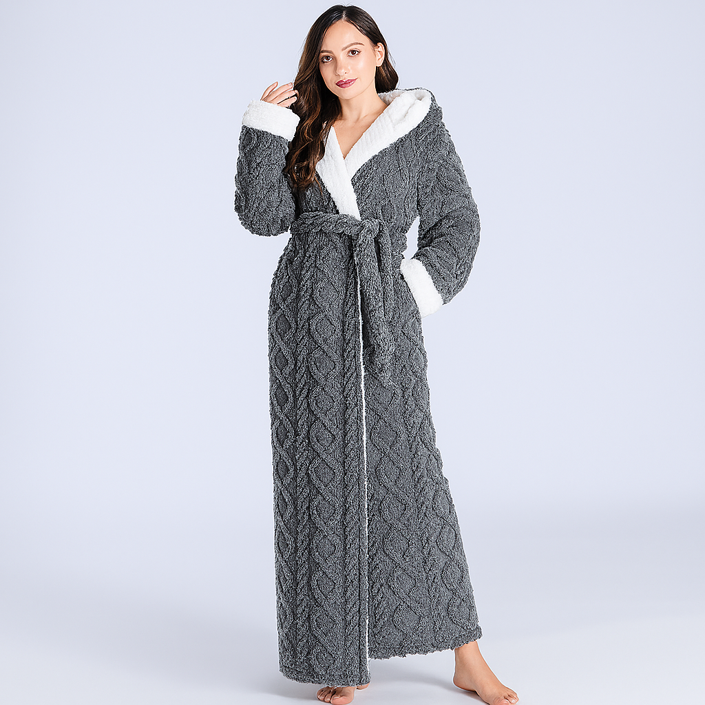 Cozy women's hooded flannel bathrobe, full-length and plush. Perfect coral fleece sleepwear for cold winter nights.