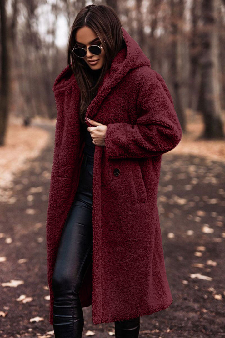 Stylish women's long plush teddy coat with a hood. Perfect cozy casual winter jacket.
