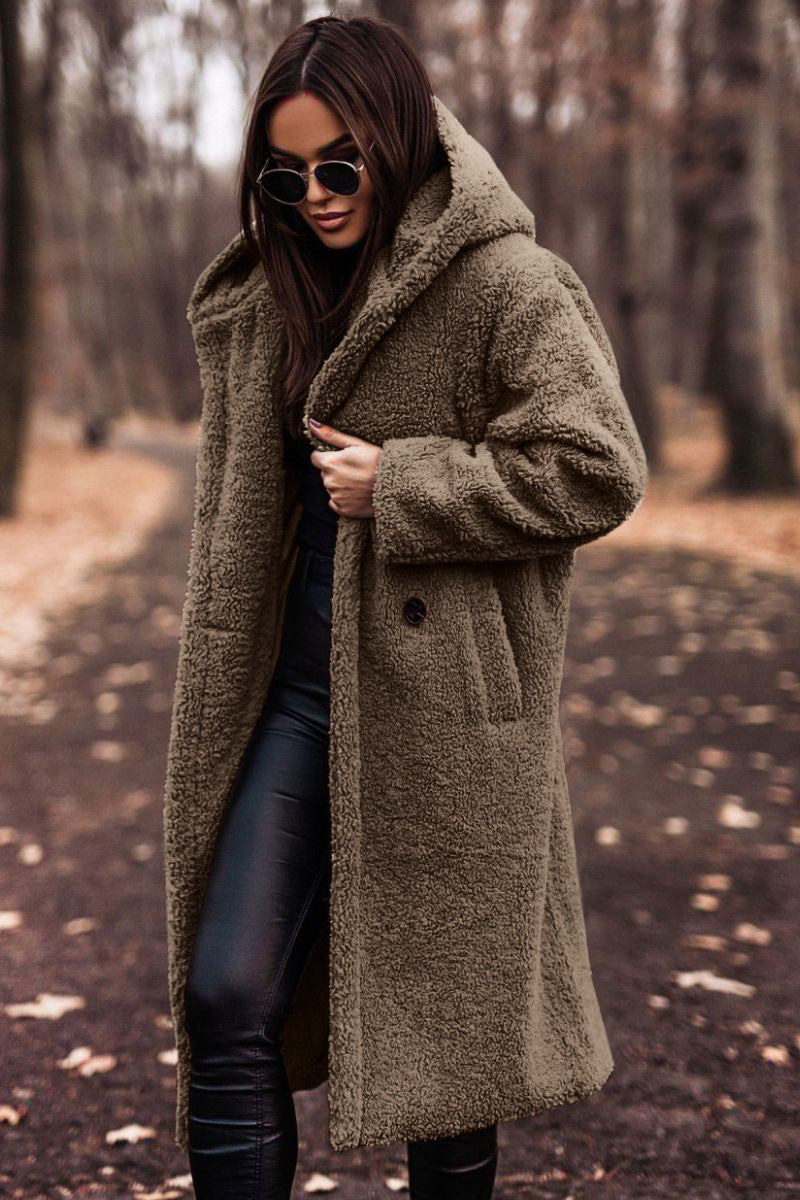 Warm women's plush hooded teddy coat. Soft, long, and trendy outerwear for cold weather.
