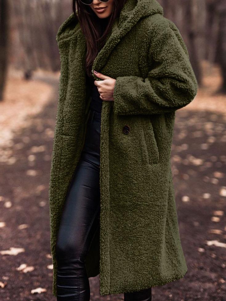 Cozy women's hooded long winter coat featuring a plush finish, great for cold weather and outerwear.