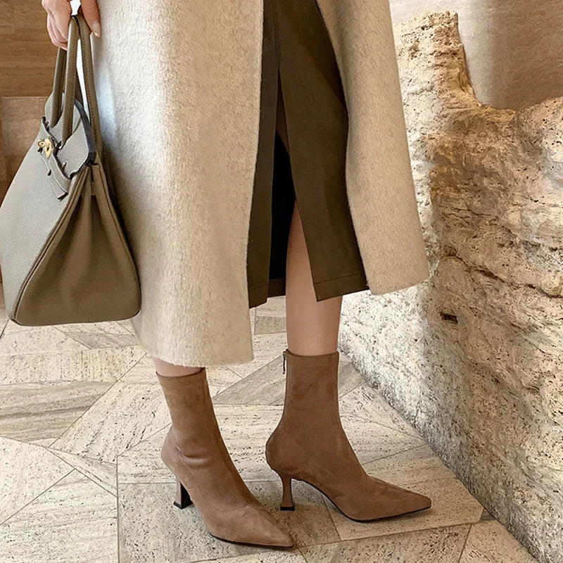 Versatile women's heeled ankle boots. Pointed toe & mid-heel make them perfect everyday and dress boots.