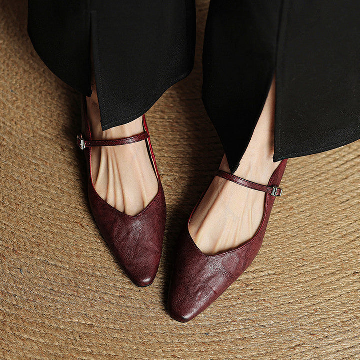 Women's dressy pointed toe mules, comfortable slip-on style, elegant strap.