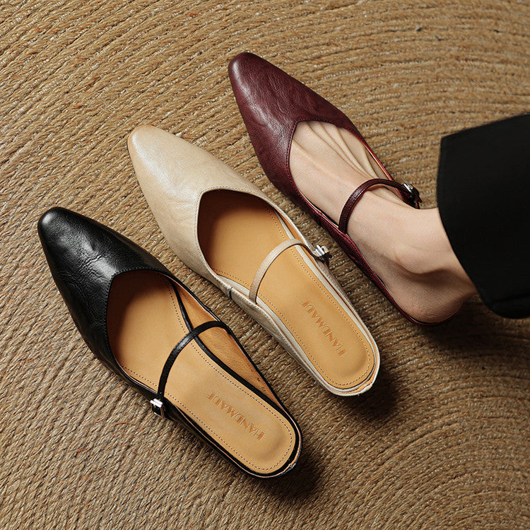 Modern women's pointed toe slip-on flats, tan, featuring a chic strap detail.