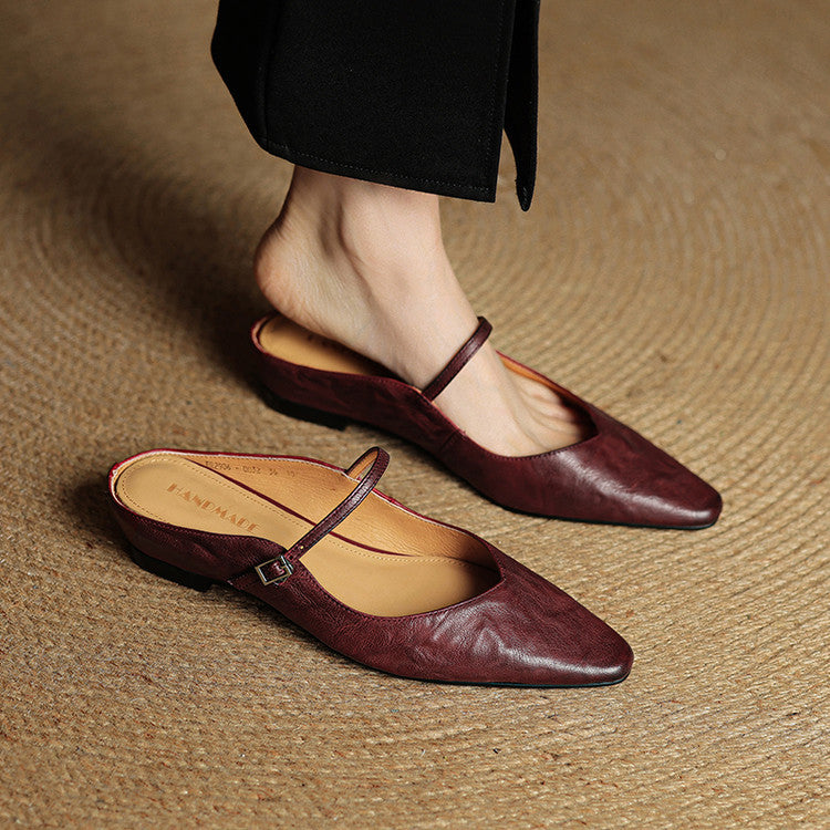 Stylish women's pointed toe mules, versatile slip-on flats with a chic strap.