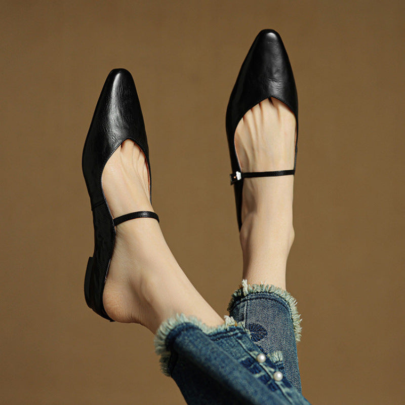 Elegant pointed toe women's mule flats, perfect for dressy or casual wear.