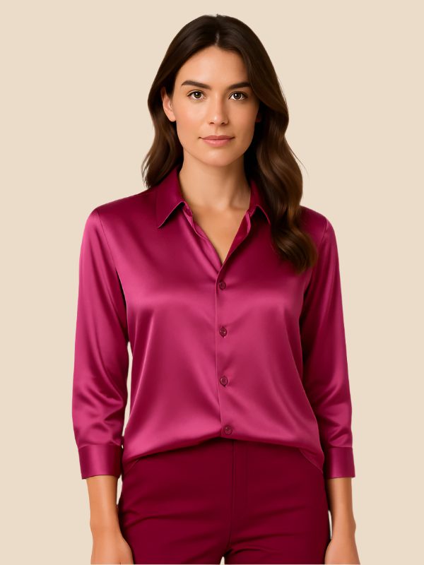 Elegant women's button-down, long-sleeve top with a crisp pointed collar, ideal for versatile styling.