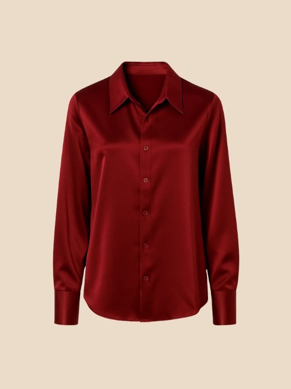 Women's polished button-down shirt, elegant long-sleeve design with a refined pointed collar.