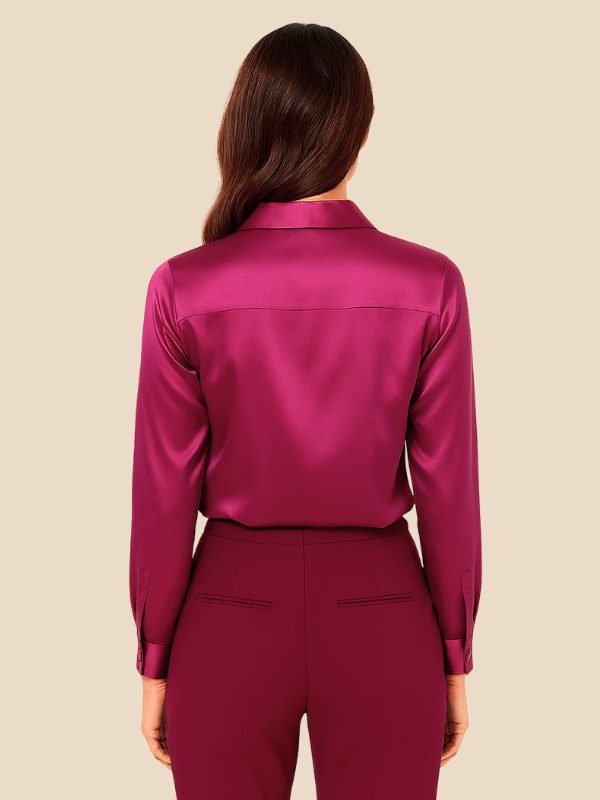 Women's elegant button-down shirt, polished finish, long-sleeve and a classic pointed collar.