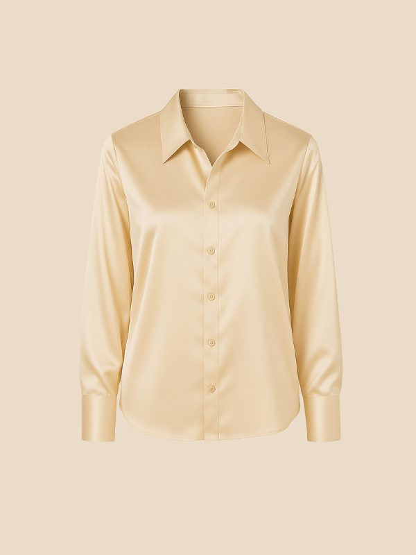 Elegant women's polished button-down, long-sleeve top with a sophisticated pointed collar.