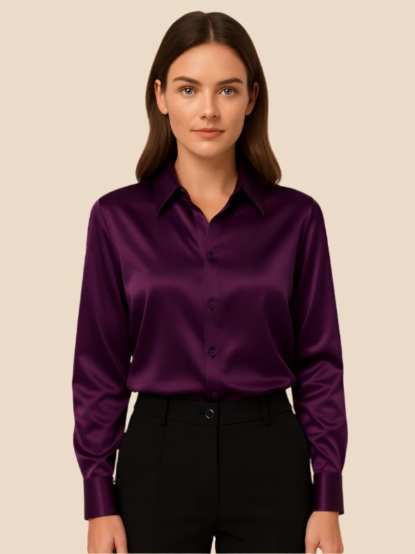 Sophisticated women's button-down, a polished long-sleeve shirt with a classic pointed collar.