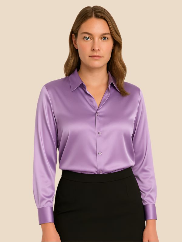 Elegant women's office button-down, a polished long-sleeve top with a sophisticated pointed collar.