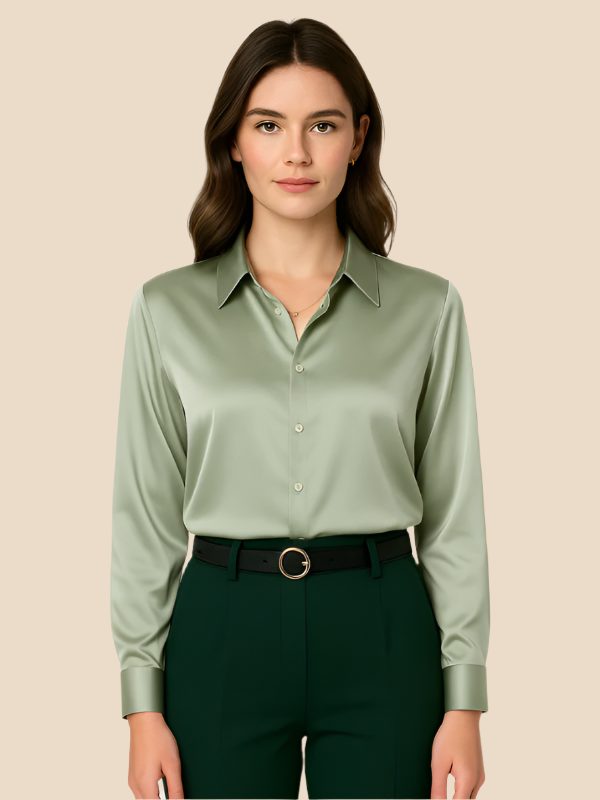 Professional women's polished blouse, button-down long-sleeve with an elegant pointed collar.