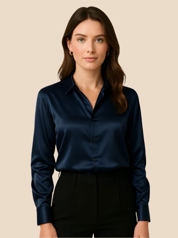 Sophisticated women's button-down blouse featuring a crisp pointed collar for professional style.