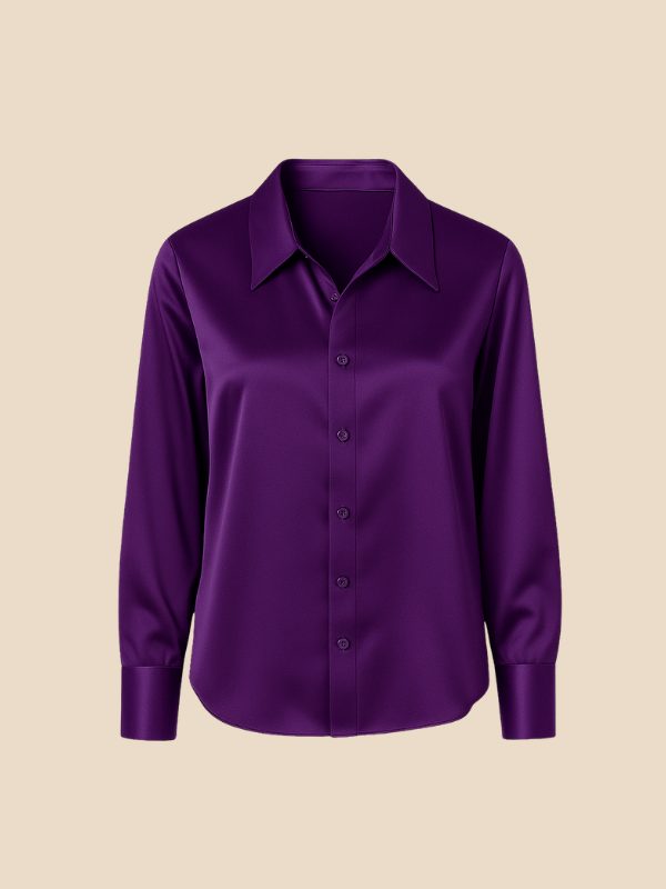 Polished women's long-sleeve shirt, a chic button-down top with an elegant pointed collar.
