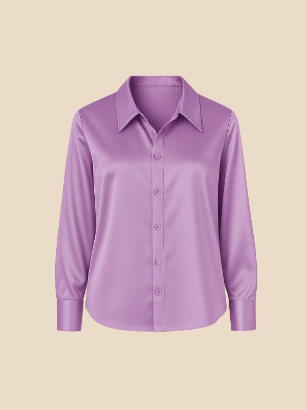 Women's elegant button-down top, a polished long-sleeve blouse with a sophisticated pointed collar.