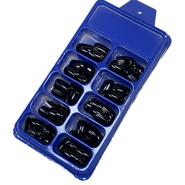 Stylish black press-on nail set for women. Premium artificial nails, perfect beauty accessory for any occasion.