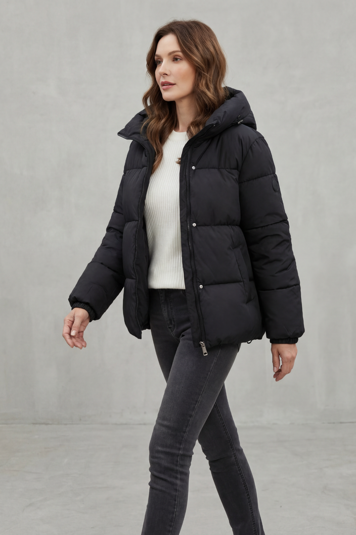 Lightweight dark green women's puffer jacket, quilted design for cozy fall & winter outerwear.