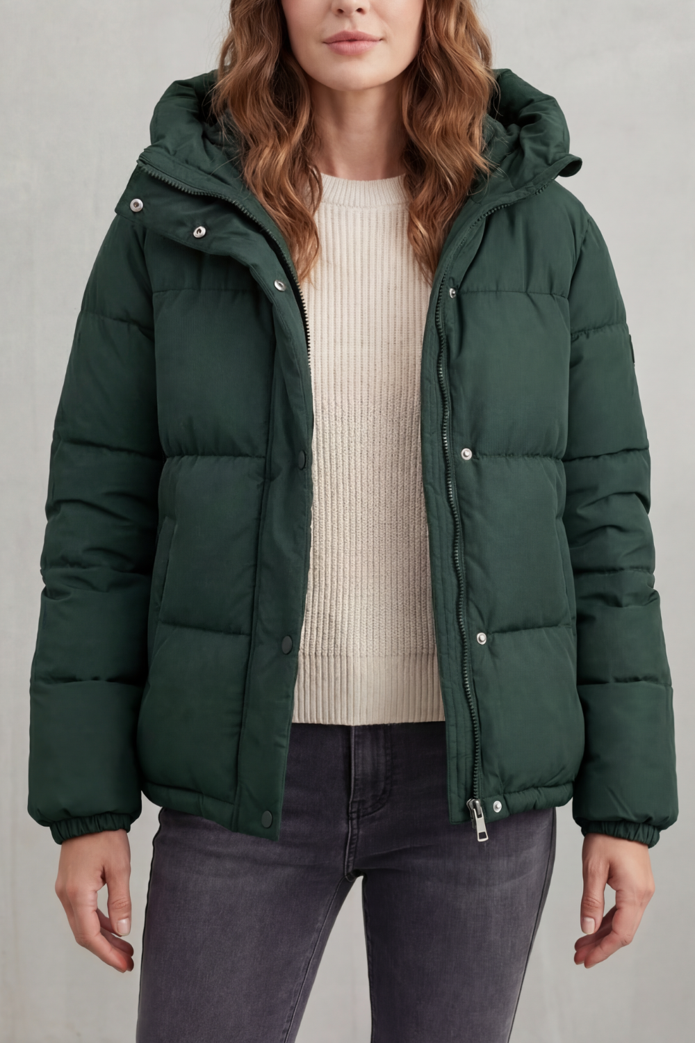 Fashionable women's quilted puffer jacket, a versatile outerwear piece for warmth & style.