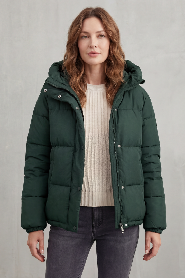Women's black premium quilted puffer jacket, lightweight, warm, & stylish for winter fashion.