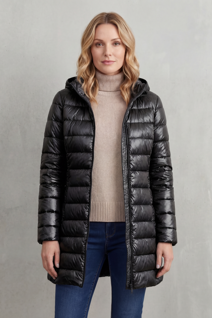 Lightweight & ultra-warm women's hooded puffer jacket. Packable outerwear for premium comfort & everyday style.