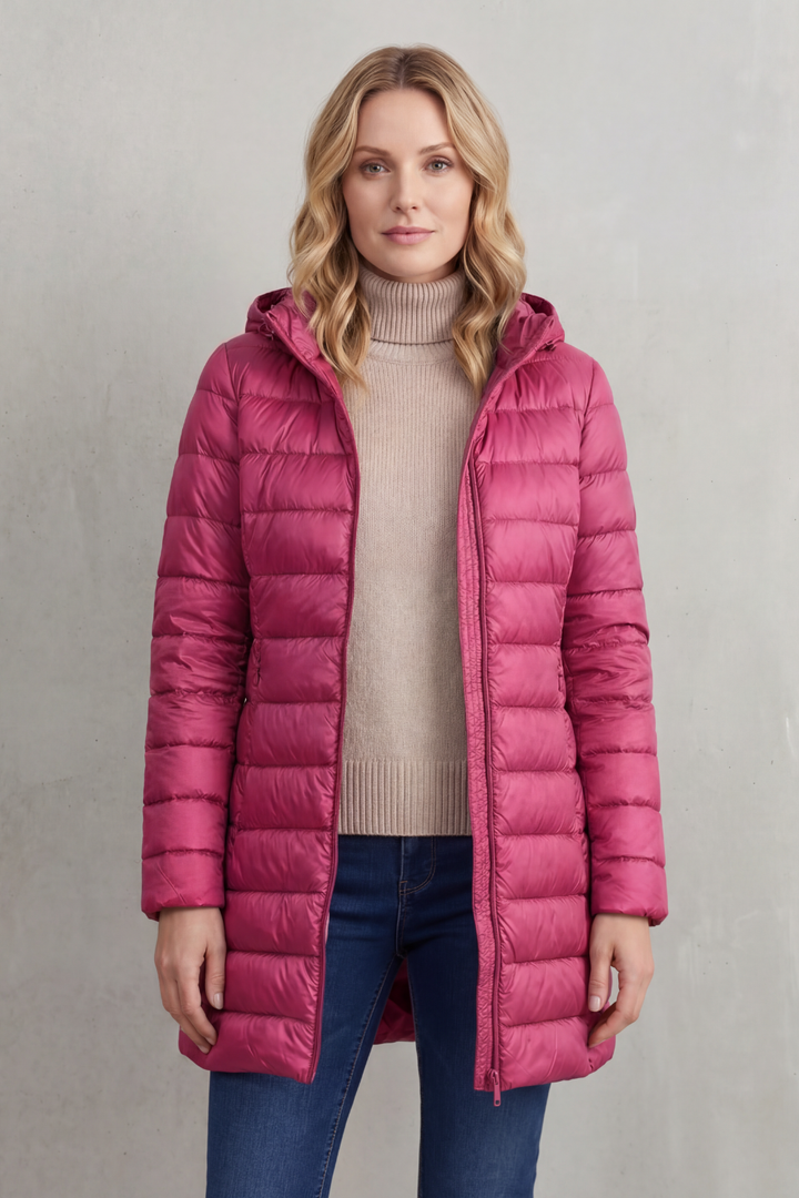 Women's premium ultra-warm hooded puffer jacket. Lightweight, packable, comfortable outerwear for any occasion.