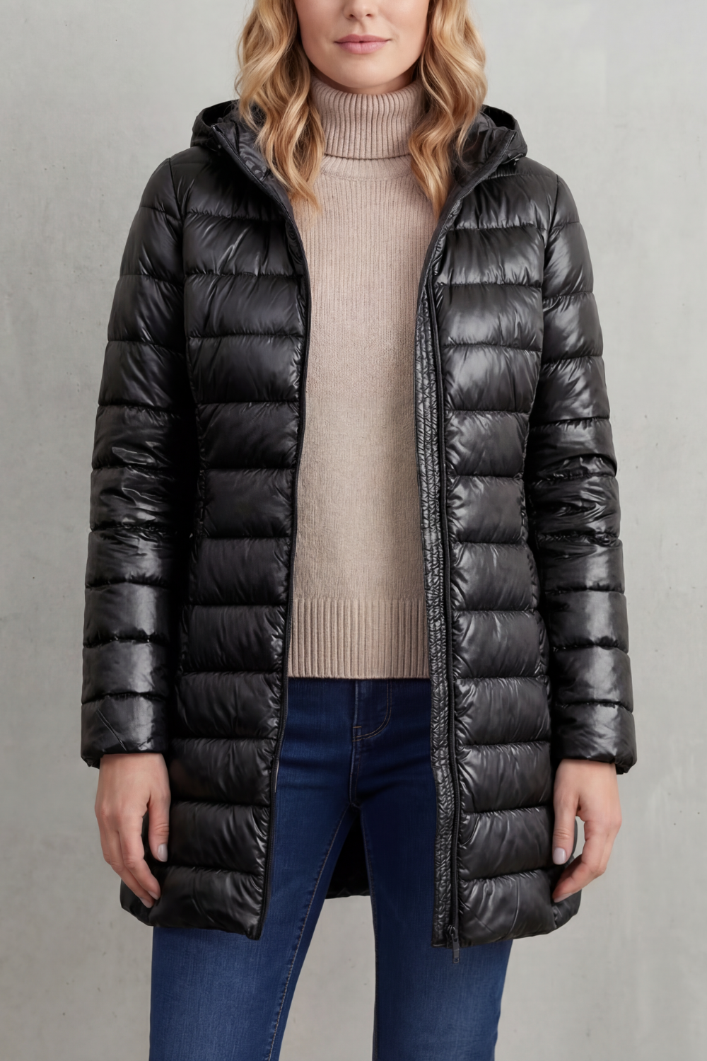 Versatile women's hooded puffer. Lightweight, packable, ultra-warm jacket for travel, casual wear, or winter sports.