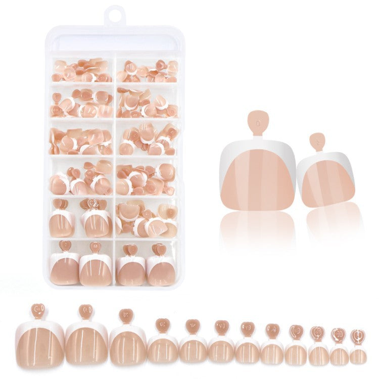 Pretty pink press-on nails, a complete beauty solution with a comprehensive manicure set.