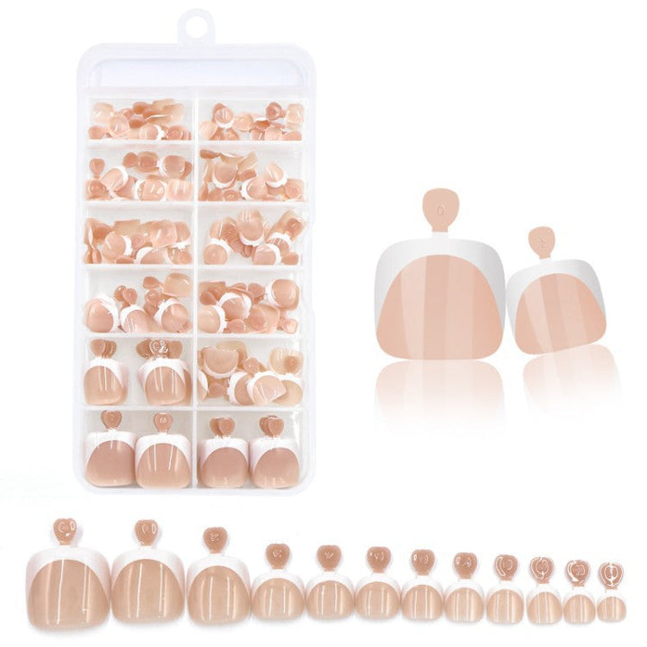 Pretty pink press-on nails, a complete beauty solution with a comprehensive manicure set.