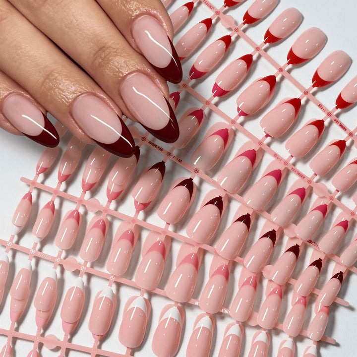 Elegant false nails featuring intricate nail art, a perfect removable press-on manicure kit for beauty.