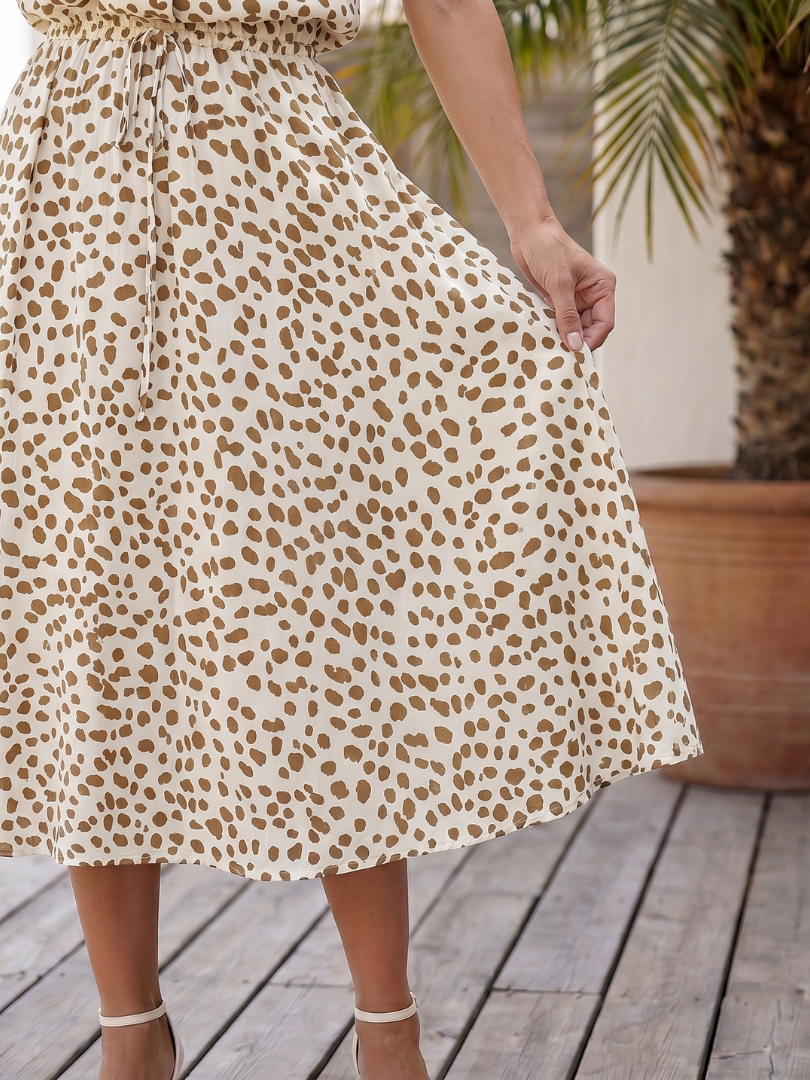 Everyday essential: women's printed midi dress, short sleeve, button-front, with a comfortable belt.