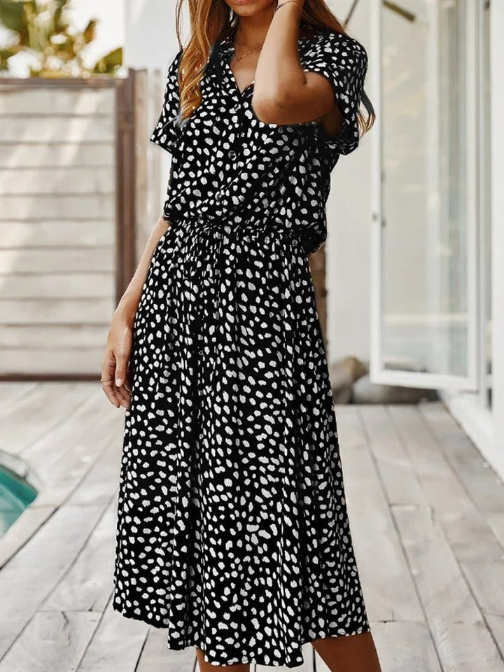 Embrace summer comfort with this women's printed midi dress, short sleeve & adjustable waist.