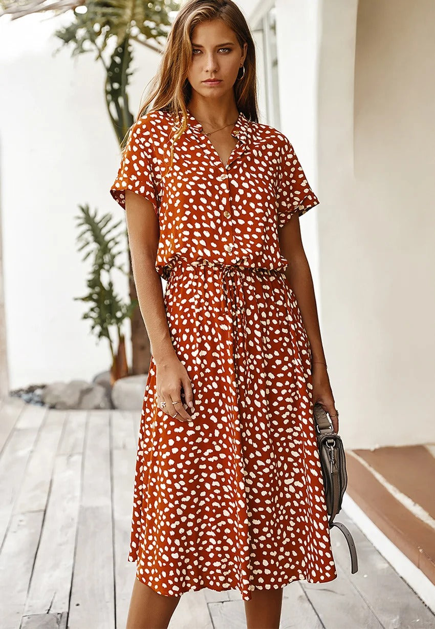Chic women's midi dress with adjustable waist, lightweight and perfect for summer days.