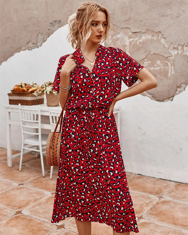 Women's printed midi dress, short sleeve, lightweight, and adjustable for summer style.