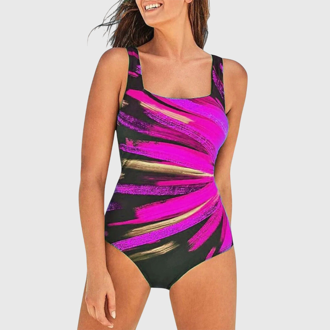 Women's printed one-piece swimsuit with tummy control, perfect for summer beach & poolside style.