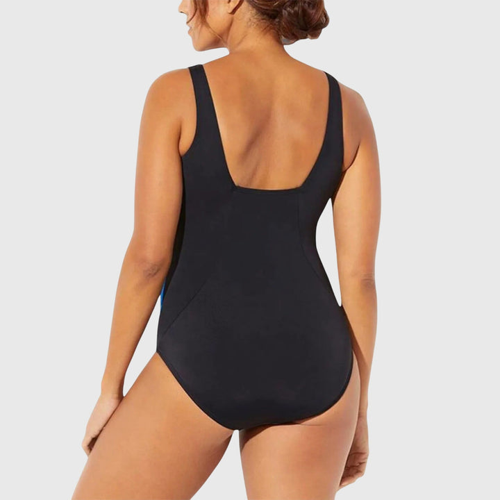 Flattering women's printed tummy control swimsuit, a stylish one-piece for summer vacations.
