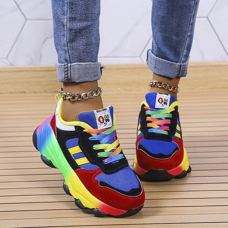 Woman walking in printed orthopedic sneakers, showcasing cushioned support for active everyday casual wear.